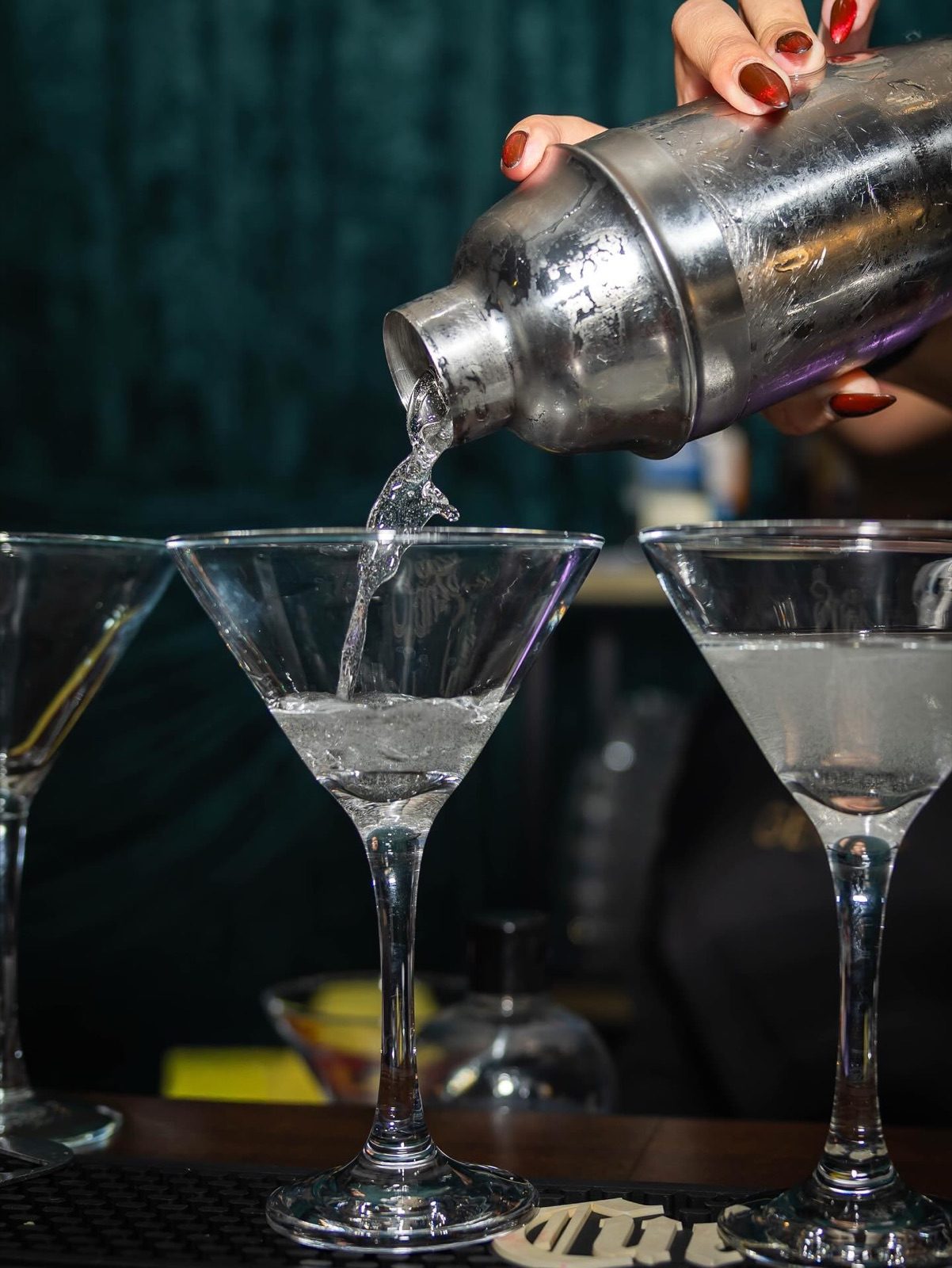 A martini tower mid-pour