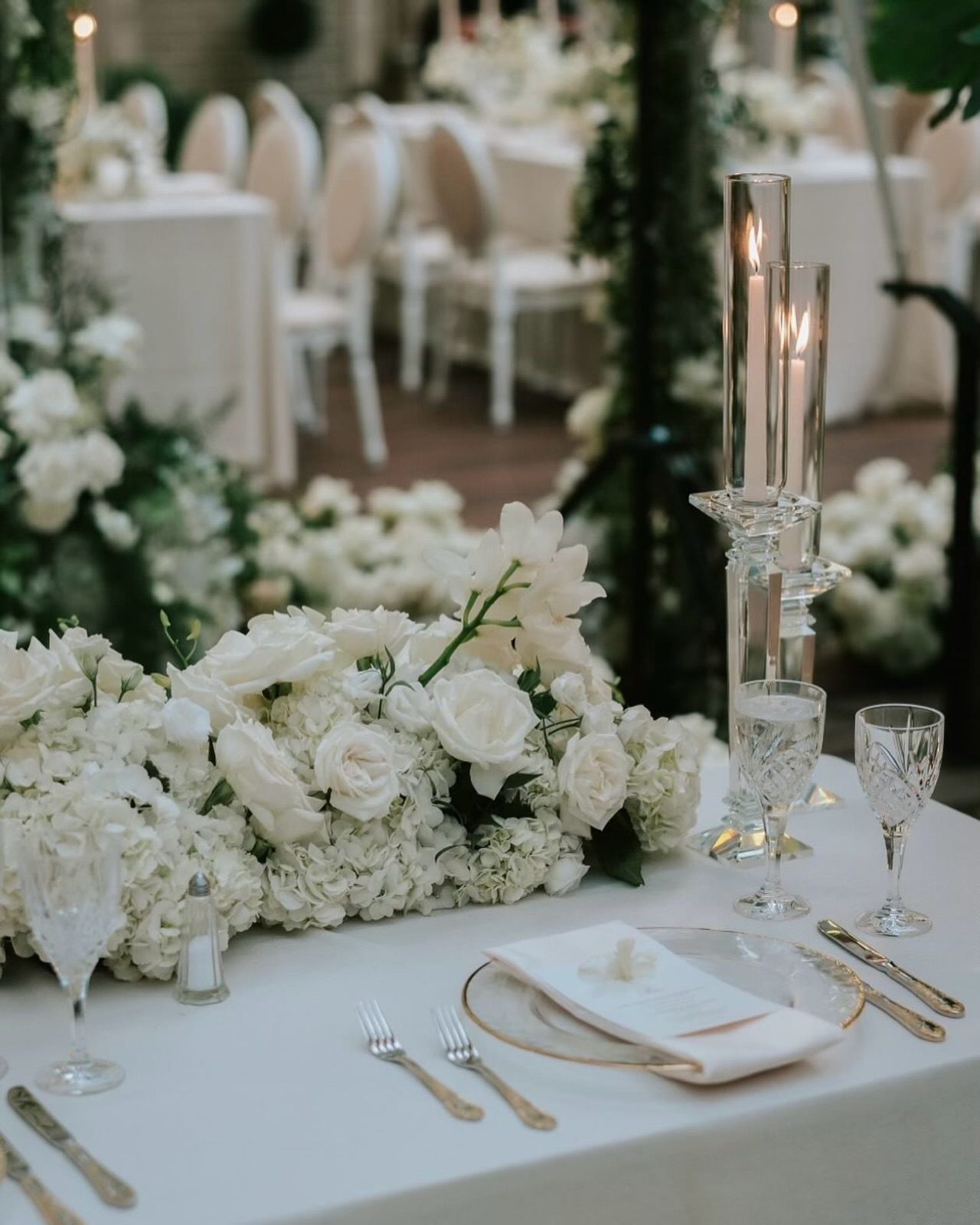 White floral tablescape for an intimate dinner