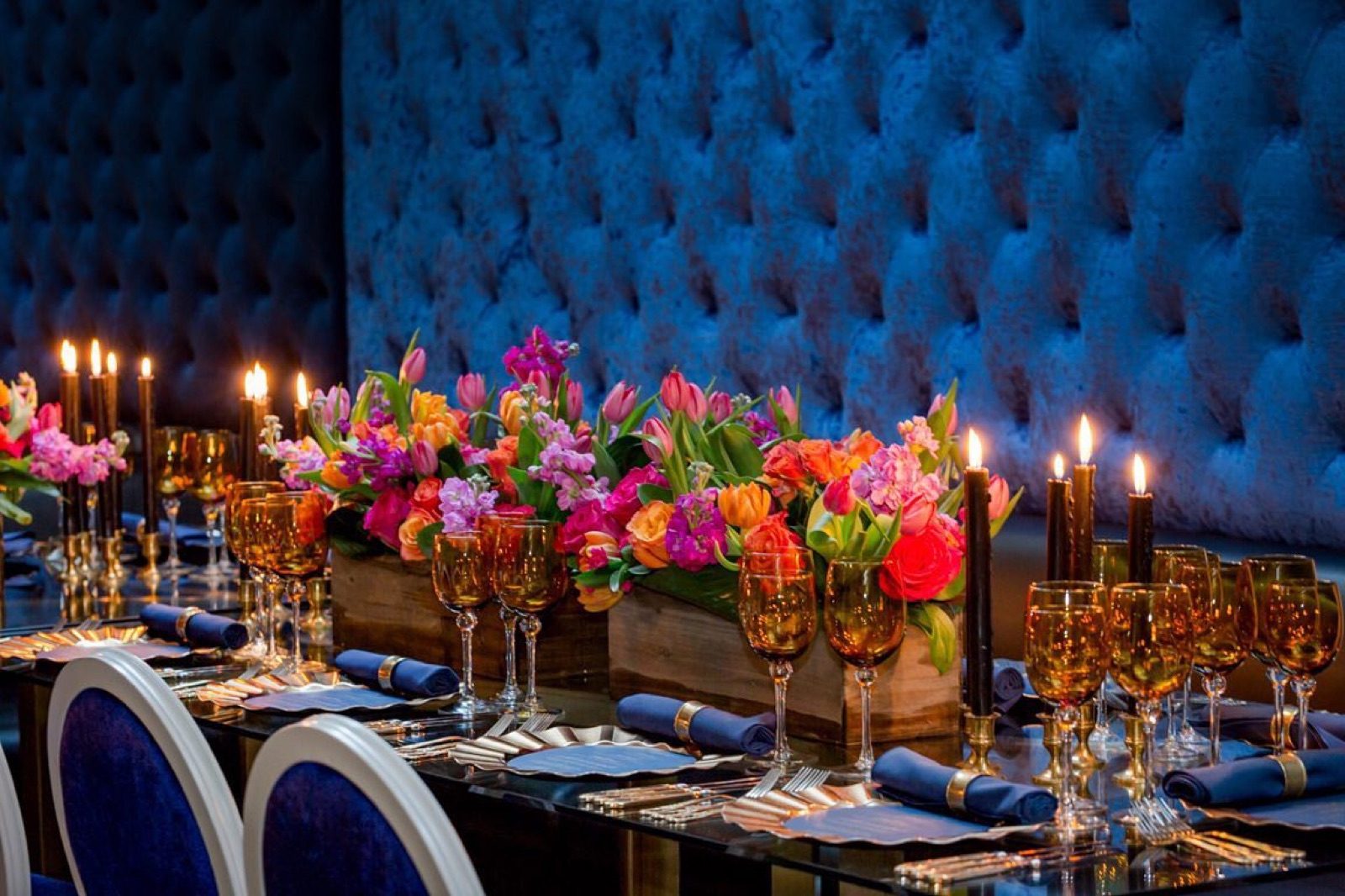 Jewel-toned party tablescape with gold goblets