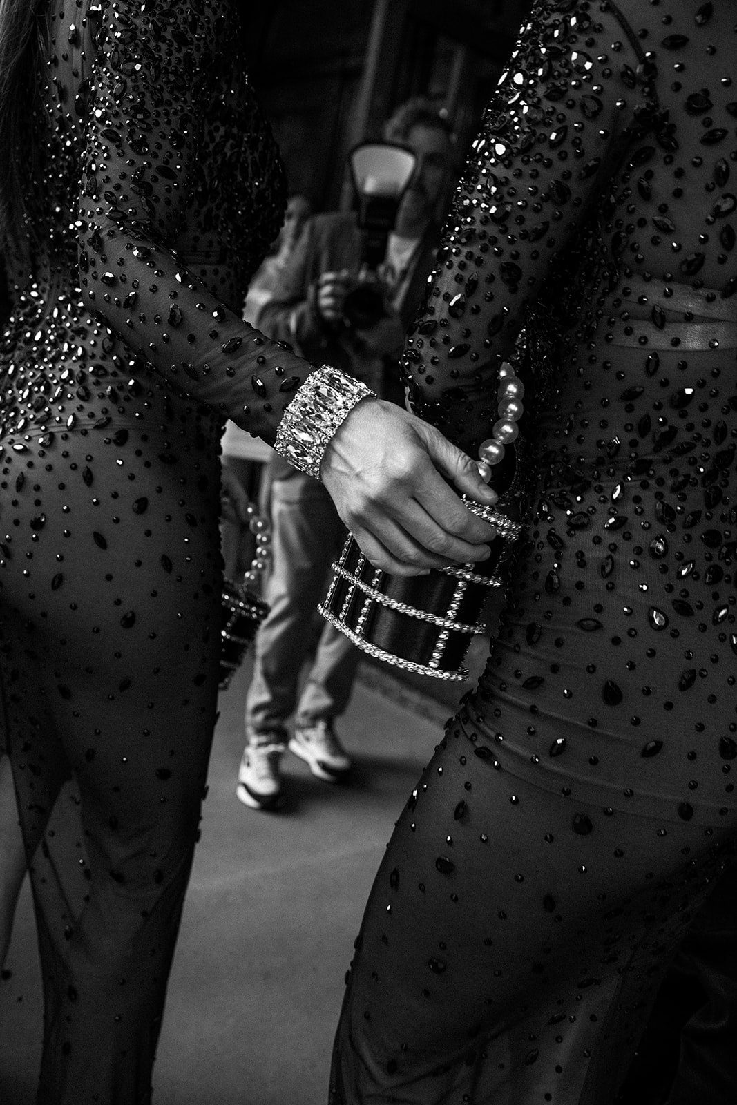 Sequins and a bracelet, in black and white