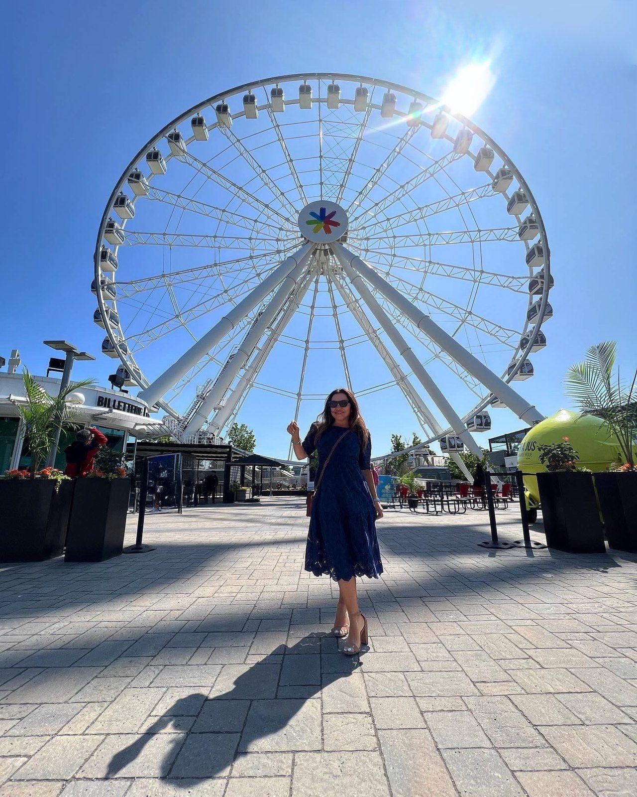 Maddy K beneath La Grande Roue de Montréal