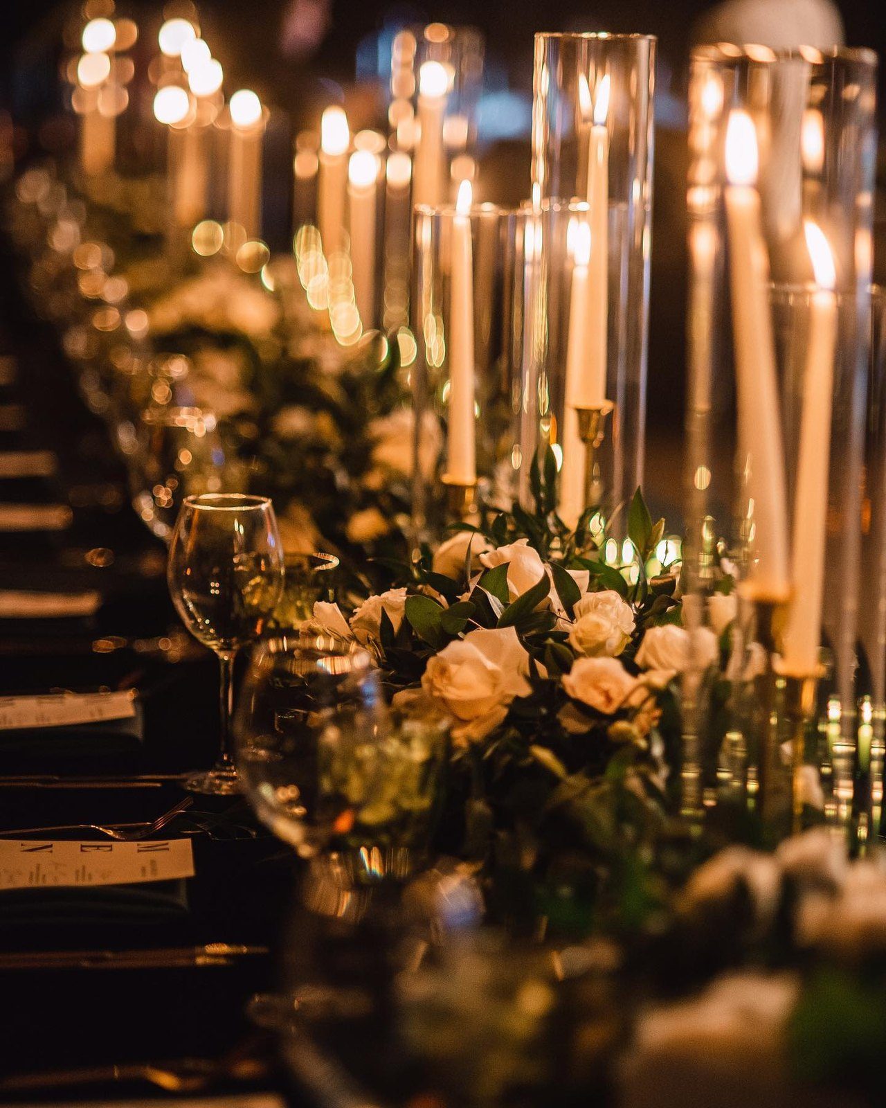 Candlelit table with roses